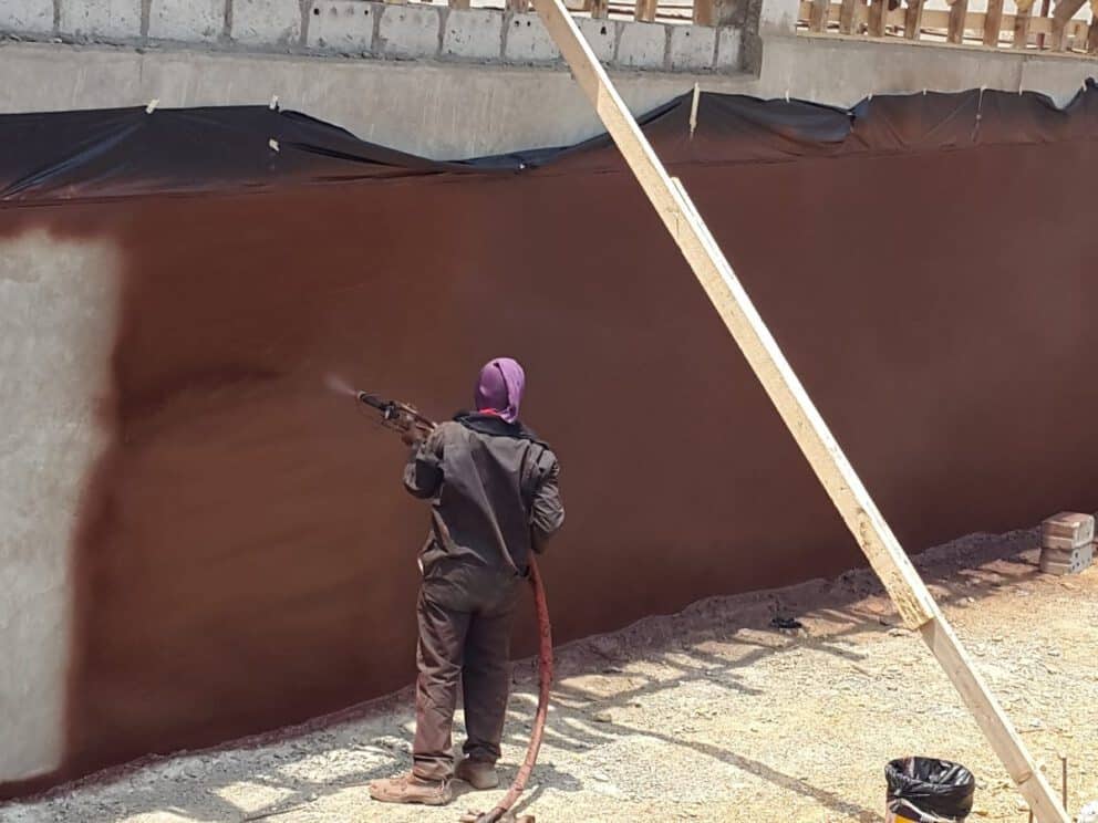 Waterproofing building foundation