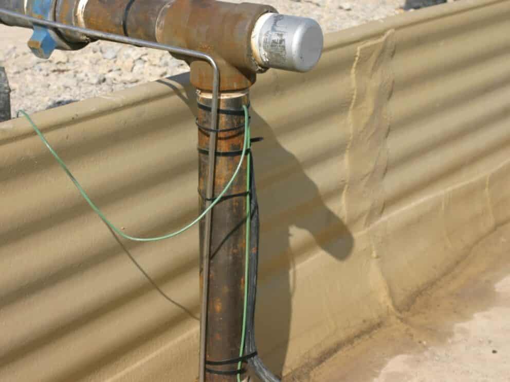 Secondary containment ArmorThane and geotextile combo
