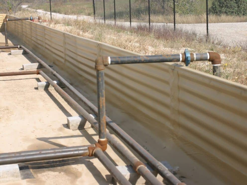 Secondary containment ArmorThane and geotextile combo