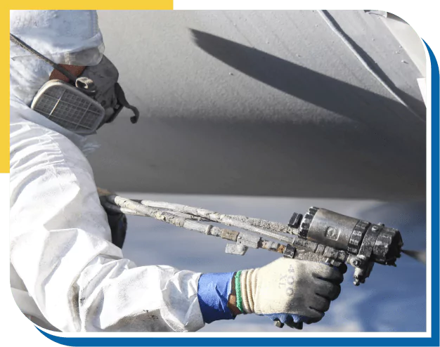 Worker Applying Protective Coating