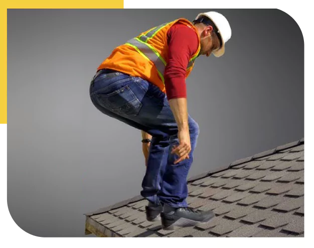 Worker Performing Roof Inspection