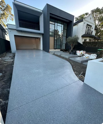 Smooth Concrete Driveway of a Modern Home