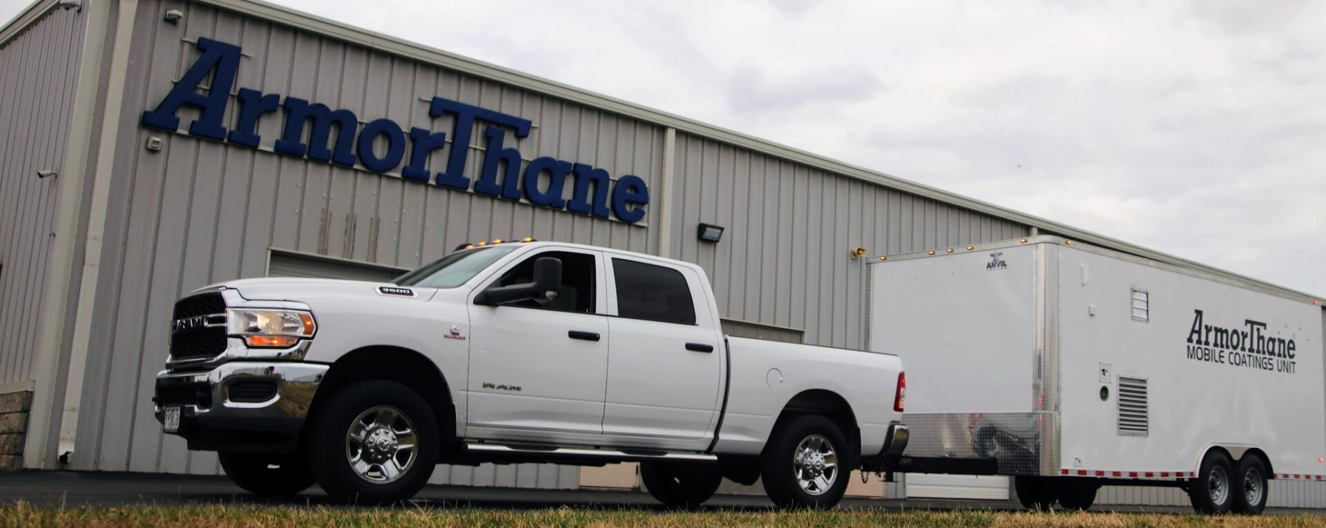 ArmorThane Mobile Coatings Unit and pickup parked outside ArmorThane headquarters