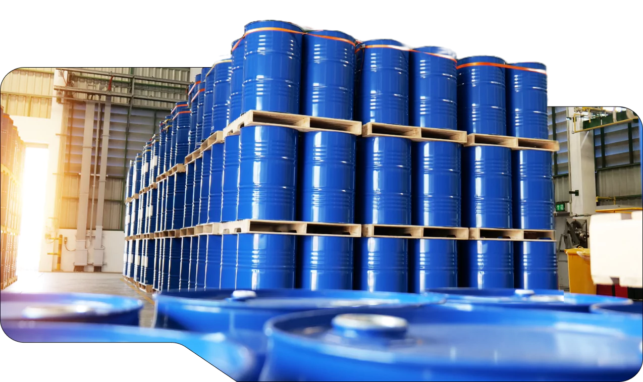 Stacked Blue Industrial Drums in a Warehouse