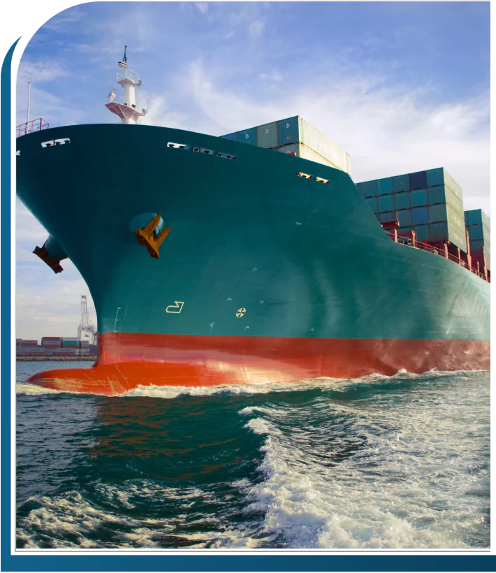 Large cargo ship with protective hull coating
