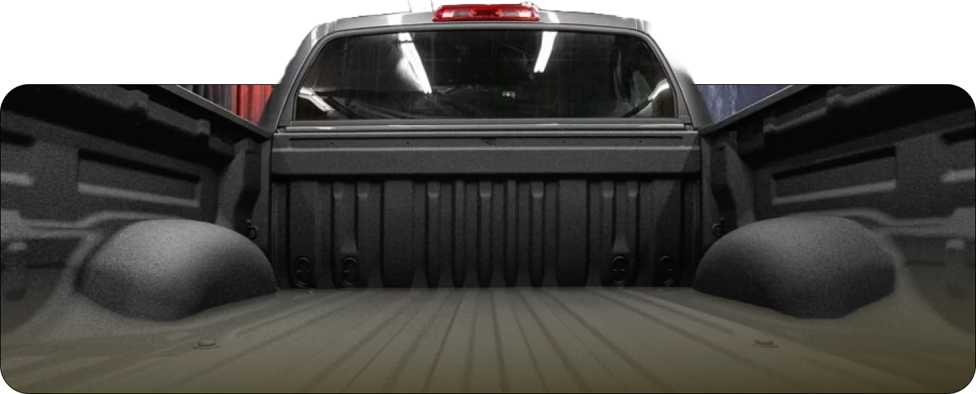 Truck bed with protective spray-on liner coating