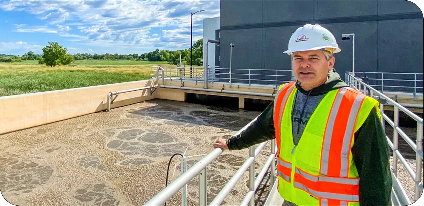 Engineer inspecting wastewater treatment plant